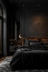 Dark, luxurious boutique-style bedroom with velvet headboard and moody lighting.